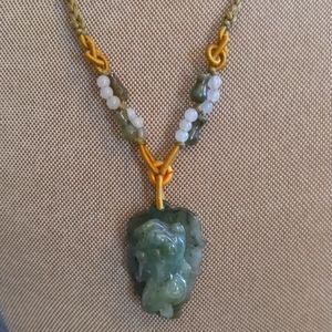 Unique "jadeite" carved guardian lion necklace